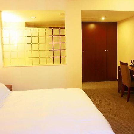 Starway Porcelain Hotel Jingdezhen Quarto foto